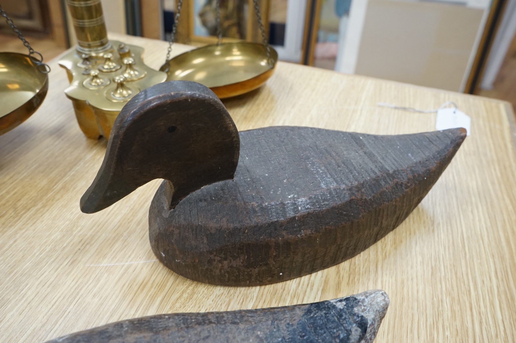 A cast iron ‘Admiral’ door-stop and two wooden decoy ducks, door stop 35cm high